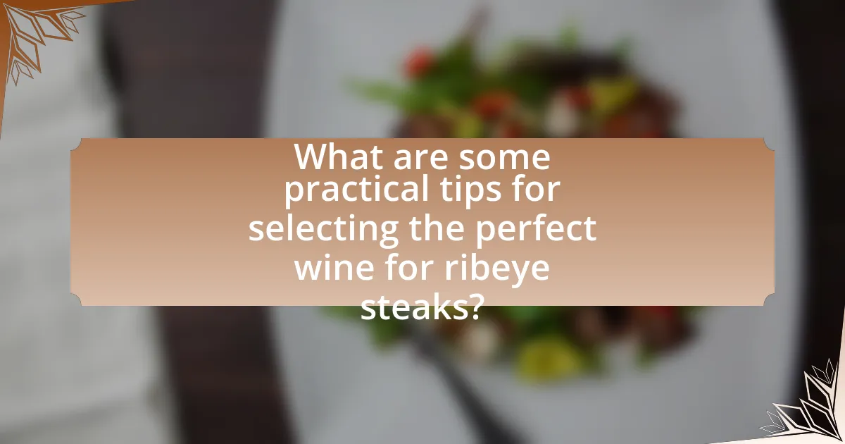 What are some practical tips for selecting the perfect wine for ribeye steaks?