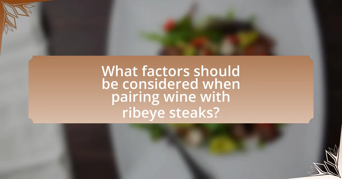 What factors should be considered when pairing wine with ribeye steaks?